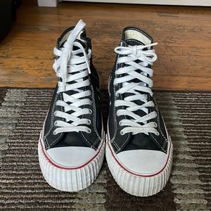 Black PF Flyers. Mens size 10 Womens size 11.5